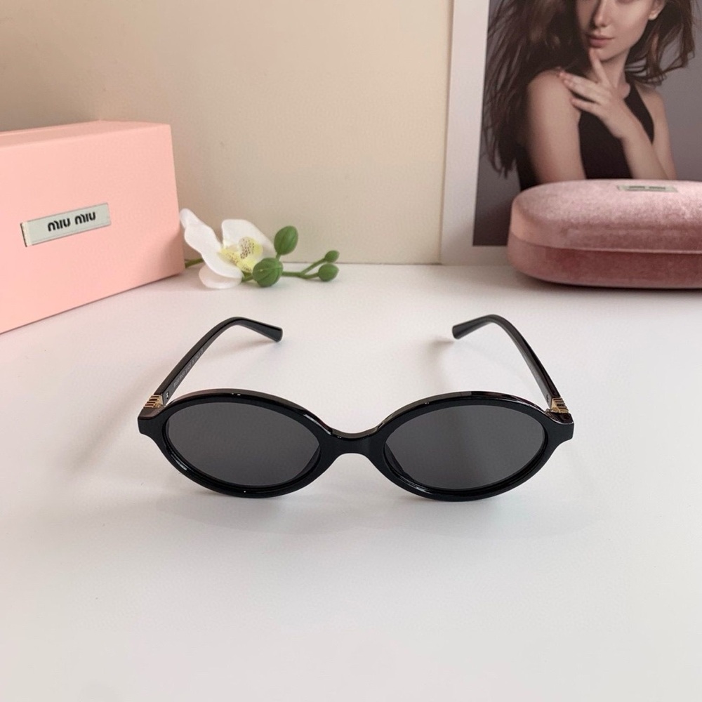 Miu Miu Sleek Black Oval Sunglasses